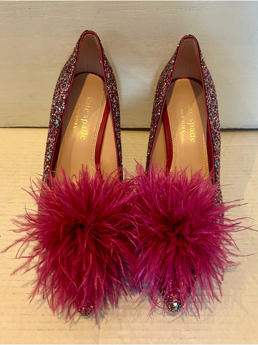 Kate Spade New York (sold out) Marabou pink heels with feather pom-poms